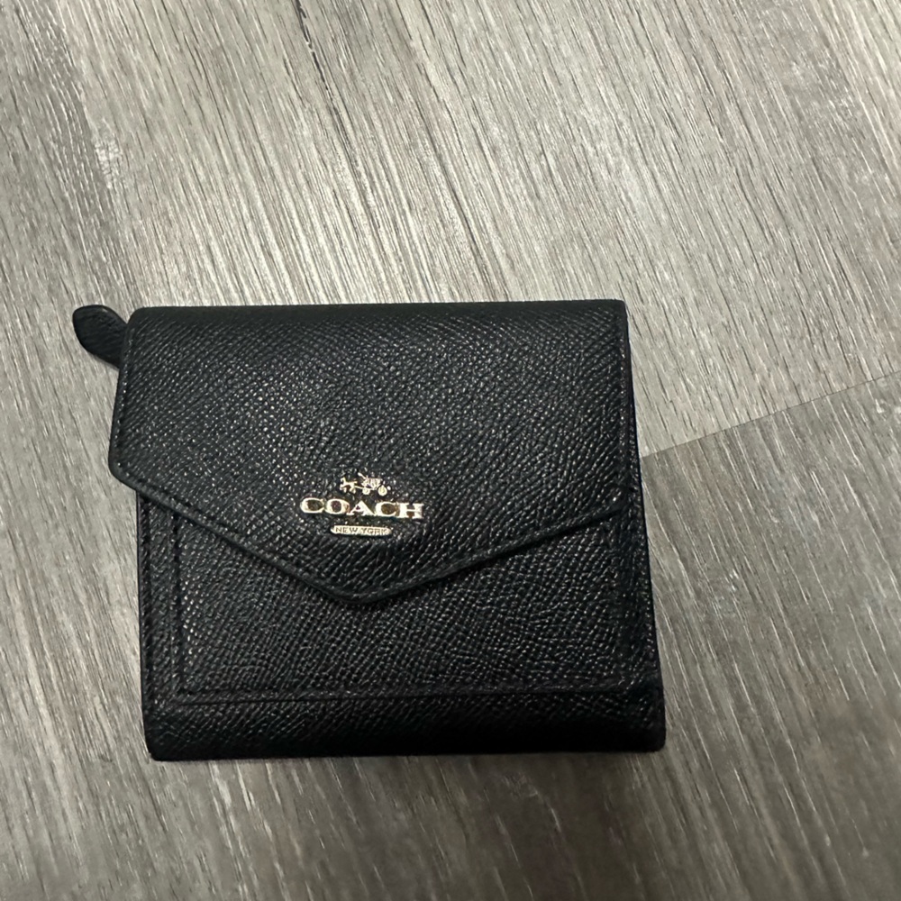Black small pocket coach wallet